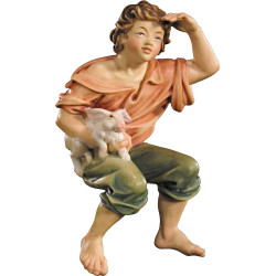 Pastor sentado con conejo